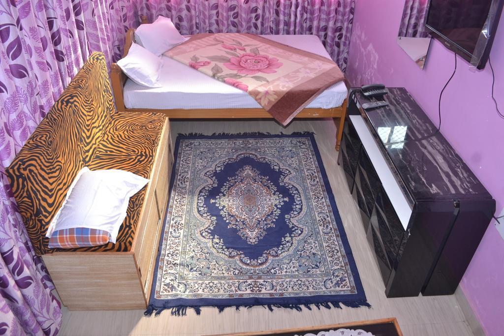 Hotel Sukh Sagar Inn Deoghar Szoba fotó